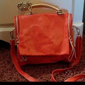 Irregular shaped red purse
